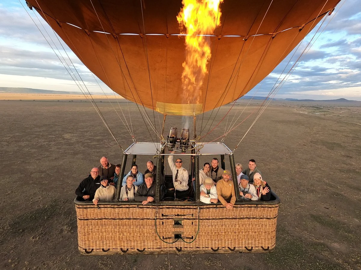 Hot air balloon safari at sunrise over the Serengeti plains — optional upgrade for the 3-Day Serengeti Safari from Zanzibar